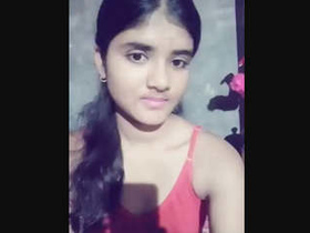 Cute girl flaunts her breasts in a seductive manner