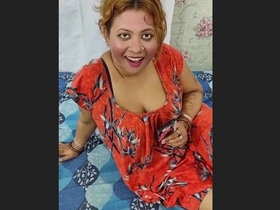 A mature Desi woman performs as a high-quality sex worker in a video