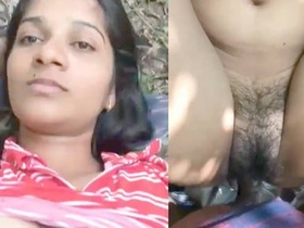 Indian beauty pleasures herself outdoors
