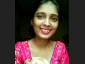 A stunning girlfriend seductively strips for her boyfriend in a tantalizing video