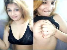 Naughty Indian babe reveals her breasts and vagina