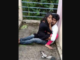 Passionate lovers engage in outdoor intimacy