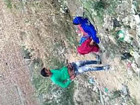 Desi Randi's loud moans are captured on video as she has sex in the bushes