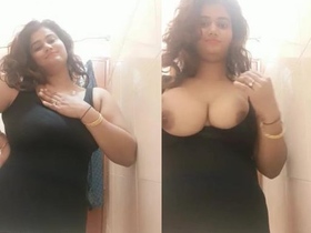 A South Asian woman with large breasts seductively reveals and entices with her charisma