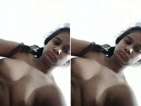 A stunning Sri Lankan girl flaunts her large breasts