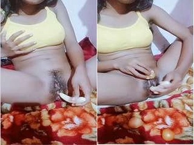 Indian girl gets naughty with a banana in this steamy video
