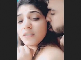 Arousing video features a Desi couple engaging in passionate standing sex