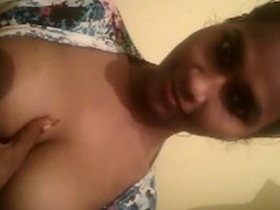 Beautiful girl flaunts her breasts in erotic video