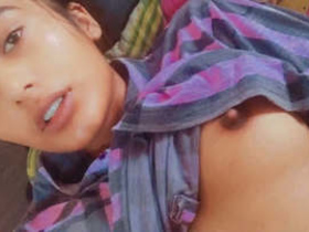 Watch a girl flaunt her boobs and pussy in a hot video