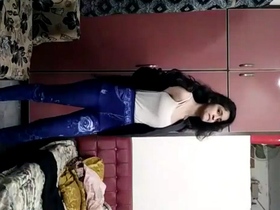 A stunning Indian beauty undresses to showcase her flawless physique