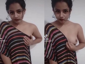 TikTok video of curvy Indian girl flaunting her large breasts