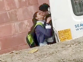 College-aged Indian teens indulge in passionate kissing