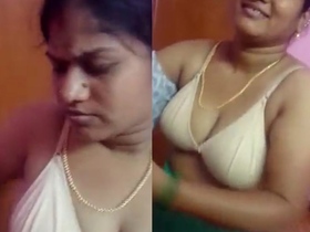 Desi aunty flaunts her hot breasts in seductive video
