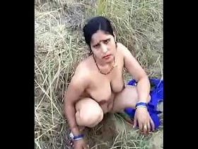 Village aunty engages in sexual activity for financial gain outdoors