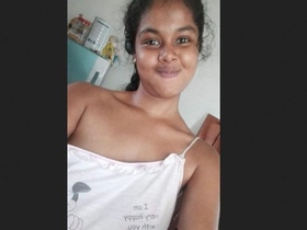 Cute desi girl flaunts her boobs and fingering skills