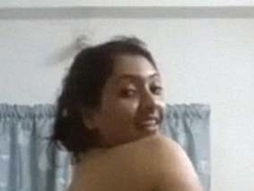 Naughty Indian babe with huge boobs gets naked and wild