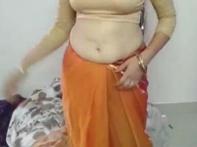 Indian aunt with large breasts and her spouse