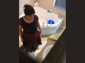 Hidden camera captures nude desi bhabhi in the tub