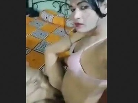 A shemale engages in sexual activity with an attractive older woman