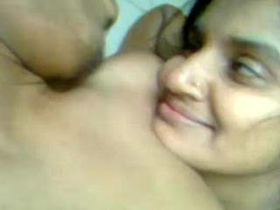 Arousing encounter of a young woman and Indian man engaging in sexual activity