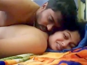 A wife is vigorously penetrated from behind by her friend in an explicit video