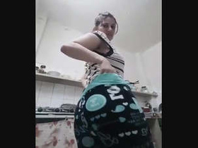 Watch a Desi bhabhi flaunt her big ass in steamy videos