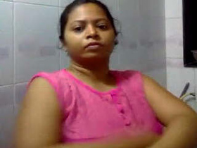 Desi bhabhi strips naked in the bathroom