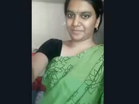 Indian bhabi with attractive breasts