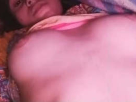 Young Indian girl reveals her virgin breasts in village video