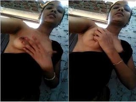 Adorable Indian girl flaunts her breasts in a seductive manner