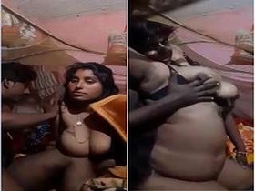 Horny Indian bhabhi thrusts her boobs and gets frantic in bed