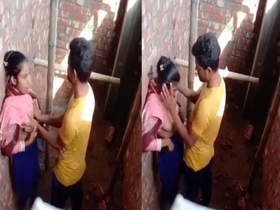 A girl from the Indian subcontinent performs oral sex on her partner while also fondling her breasts