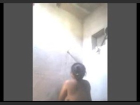 Razia's sensual shower scene with erotic overtones