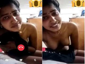 Cute Indian girl flaunts her breasts in a steamy video