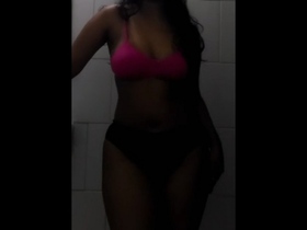 A seductive striptease by a stunning woman with an attractive physique