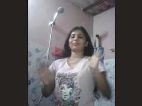 A seductive Indian beauty takes a bath