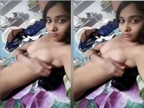 Exclusive video of a stunning girl playing with her tits and masturbating
