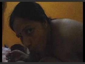 High-definition video of sensual oral acts performed by Indian aunty