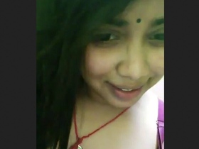A young woman discovers her sensuality with her ample bosom
