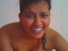 Adorable college girl records a video for her boyfriend