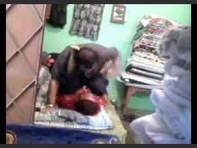 Mature Pakistani couple engages in intimate bedroom activities