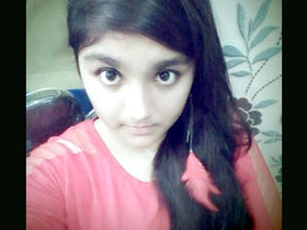 A charming college girl with large breasts reveals her sensual physique