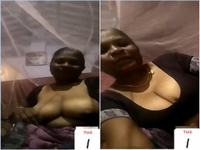 Auntie from India reveals her breasts to her lover in video call