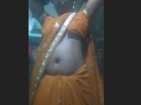 Village bhabhi reveals her sensual side with breasts and pussy show