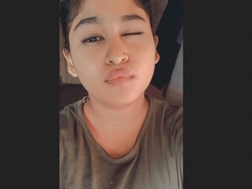 Adorable girl reveals herself from the restroom