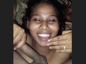 Indian wife gives a blowjob to a large penis