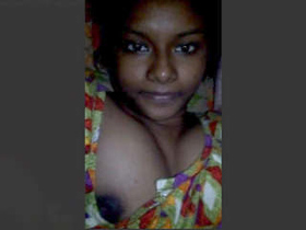 A charming Indian girl flaunts her ample bosom
