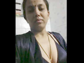 Hot Desi bhabhi in black bra and panties in the bathroom - Masturbation