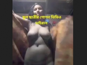 A stunning local woman from a picturesque village indulges in self-pleasure by fingering herself.