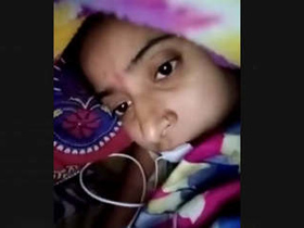 A young Indian girl gets her pussy and tits pleasured in a video call